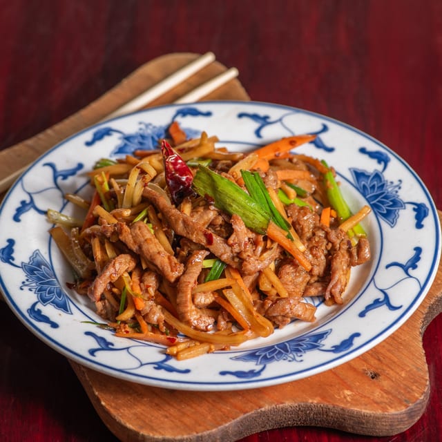 42. Shredded beef with spicy sauce.