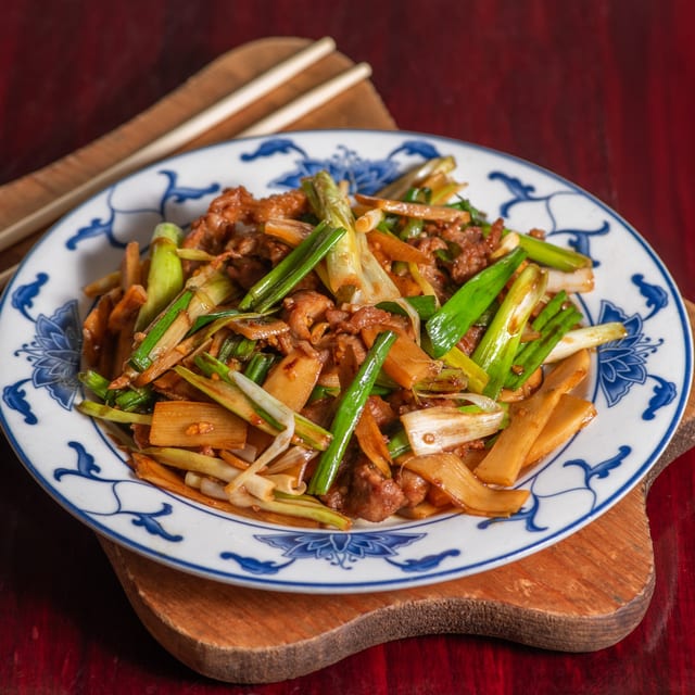 37. Sliced beef with scallions.