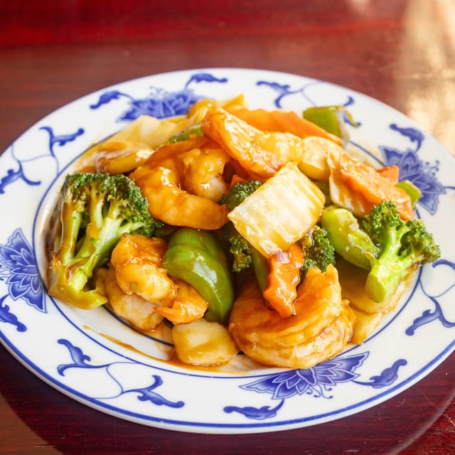80. Jumbo shrimp with mixed vegetables.