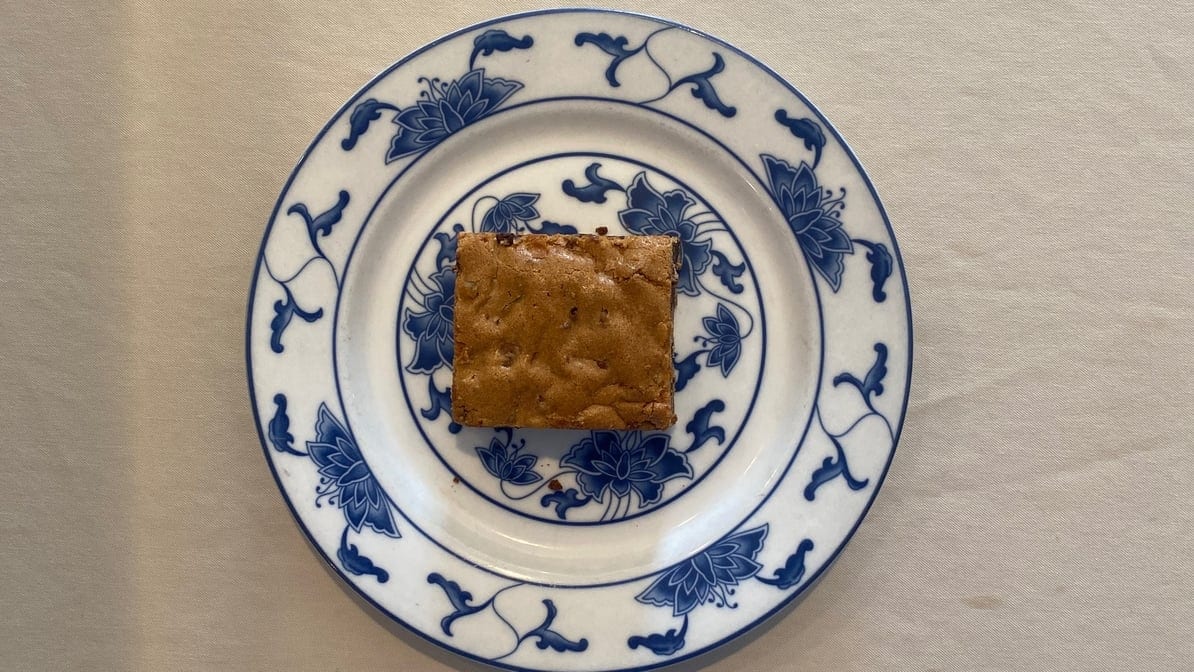 Blondie brownie with chocolate chip & nuts.