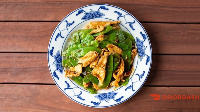 70. Chicken with snow peas.