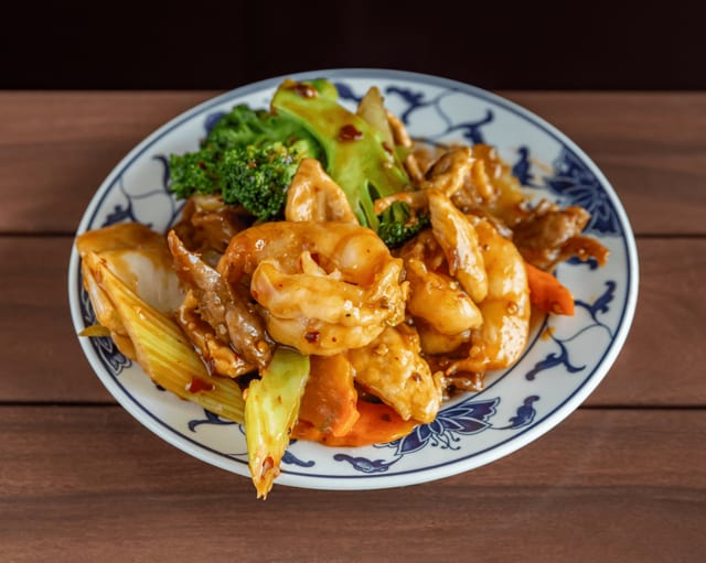 S-33. Triple delight in garlic sauce.
