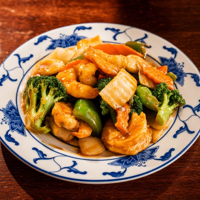 80. Jumbo shrimp with mixed vegetables.